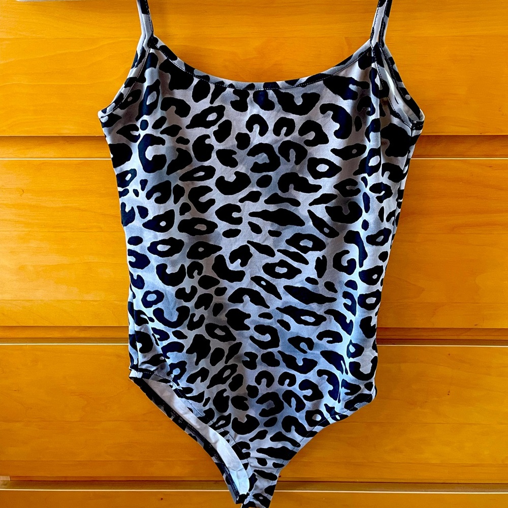 Leopard pattern bodysuit. GREAT condition. Worn once before. Medium Size
